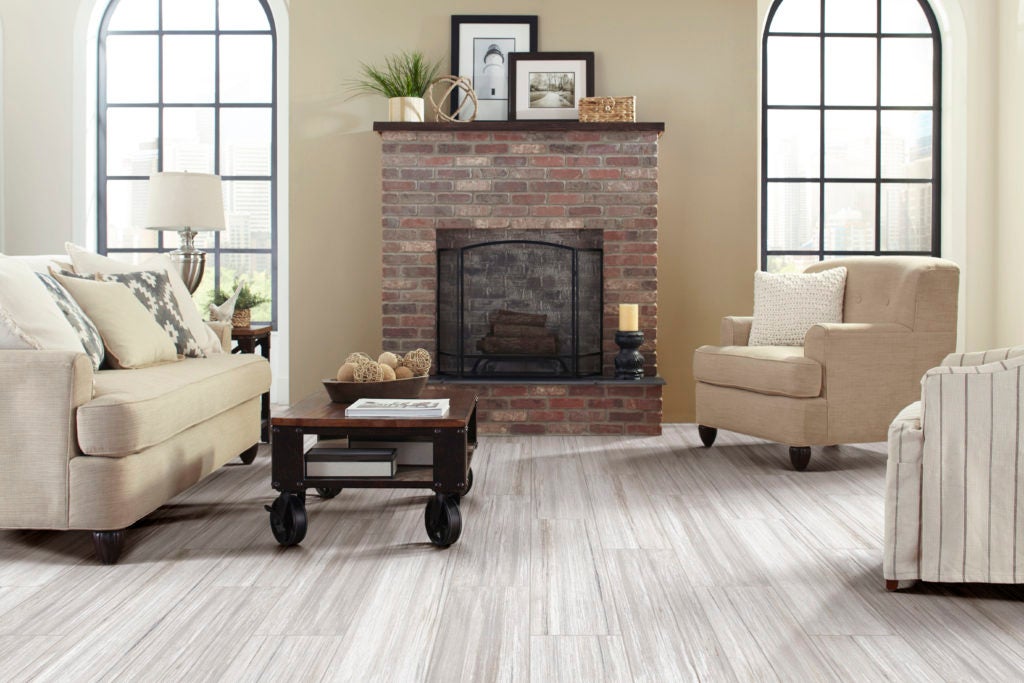 A classic style living room with porcelain tile floors.