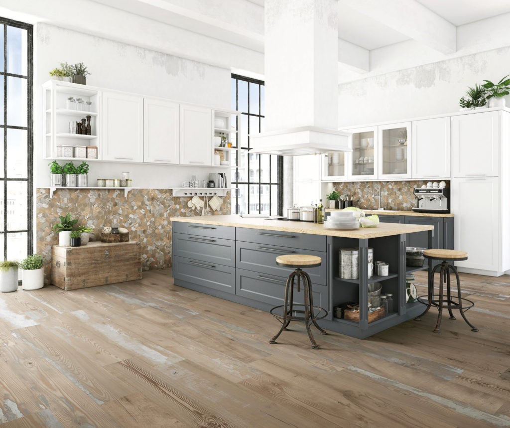 Industrial style kitchen with wood plank floor and porcelain tiles