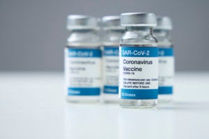 Vaccine vials with a label that reads "Coronavirus vaccine"