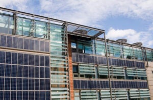 An office building covered in solar panels