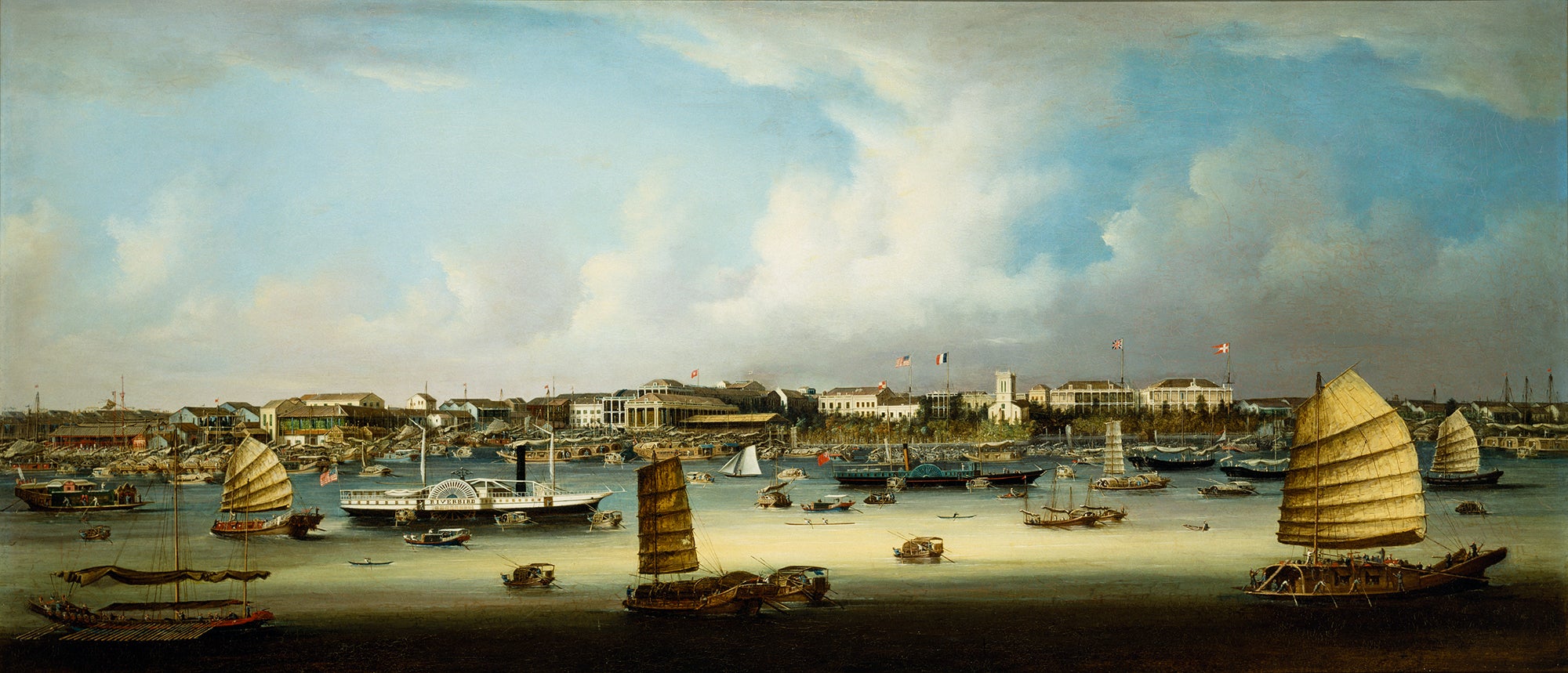 An expansive port landscape filled with different kinds of ships