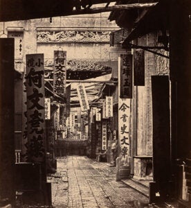 A black and white picture of a Chinese market