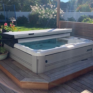Turn your backyard into an oasis with New England Spas