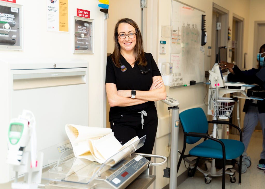Elizabeth Robinson, nurse at Boston Medical Center, smiles for the camera.
