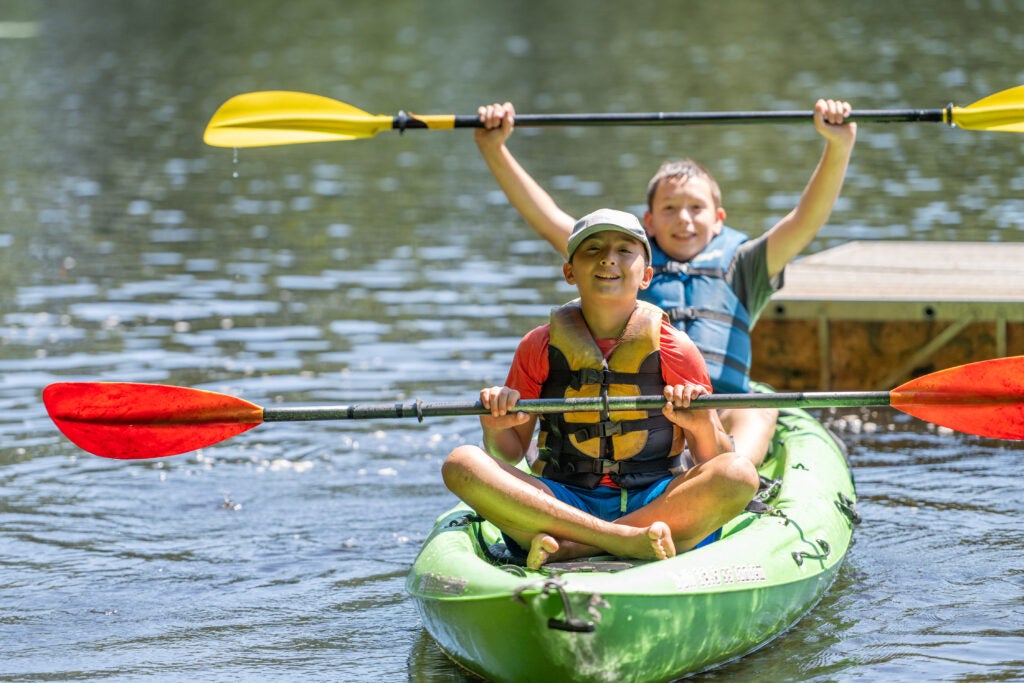 Two boys in a kayak
