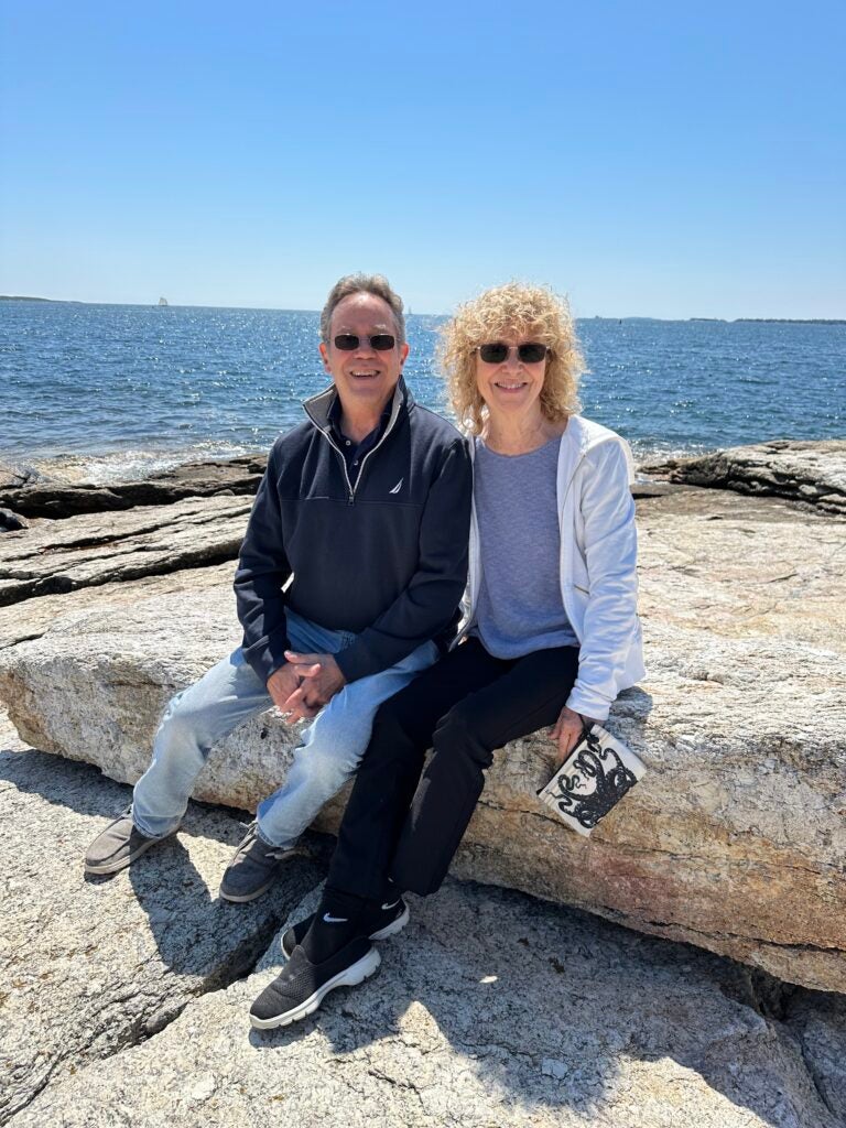 Allan and Mary sitting in a rock