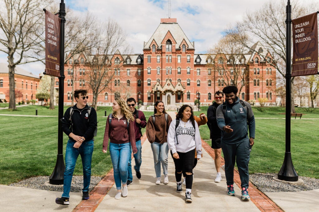 Students walking together in a college campus 